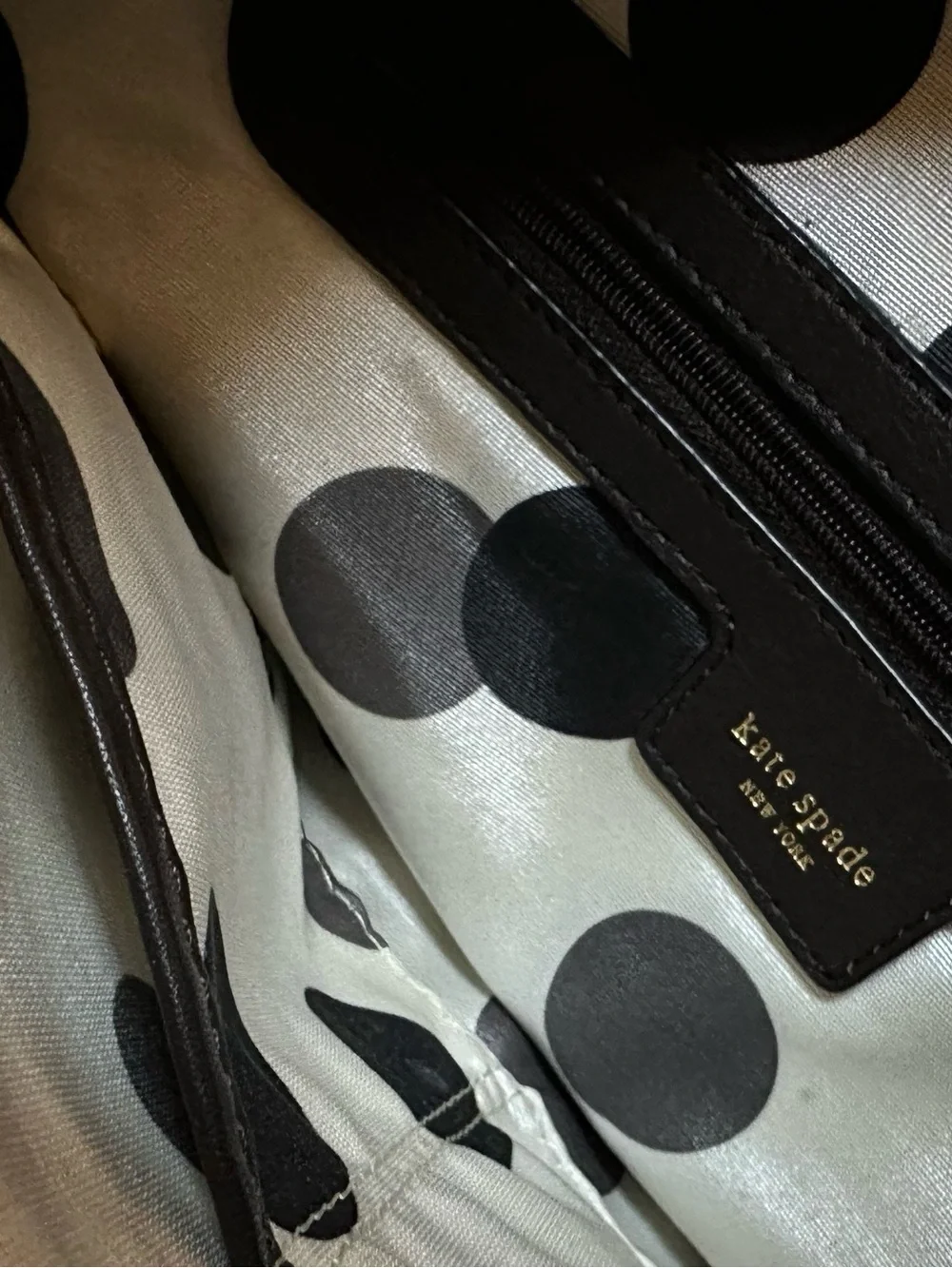 kate spade black leather tote with star emblem hardware